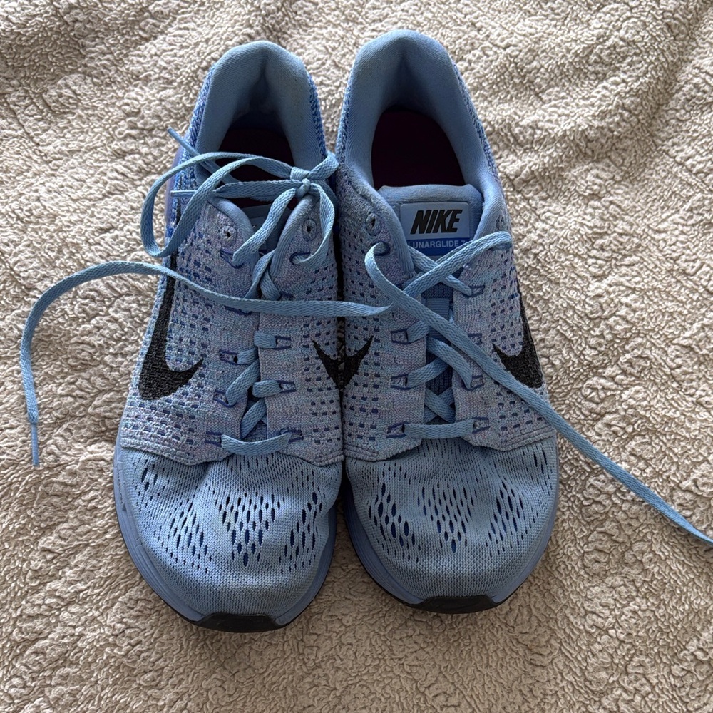 Nike Light Blue Women's Running Sneakers with Black Swoosh